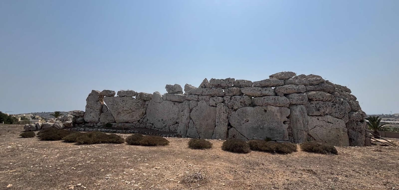 The massive stone walls of the Ġgantija Temples at Xagħra, Gozo